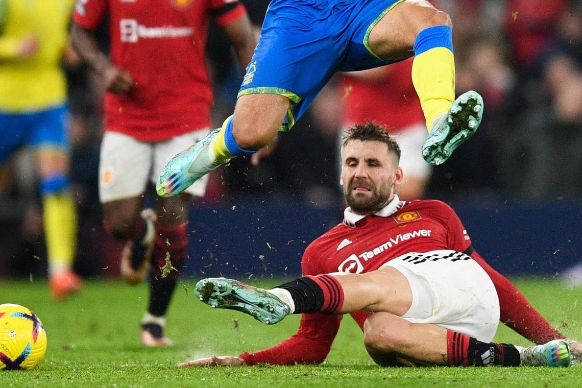 Manchester United's English defender Luke Shaw tackling Nottingham Forest's Welsh striker Brennan Johnson in the Red Devils' 3-0 win on Dec 28. 