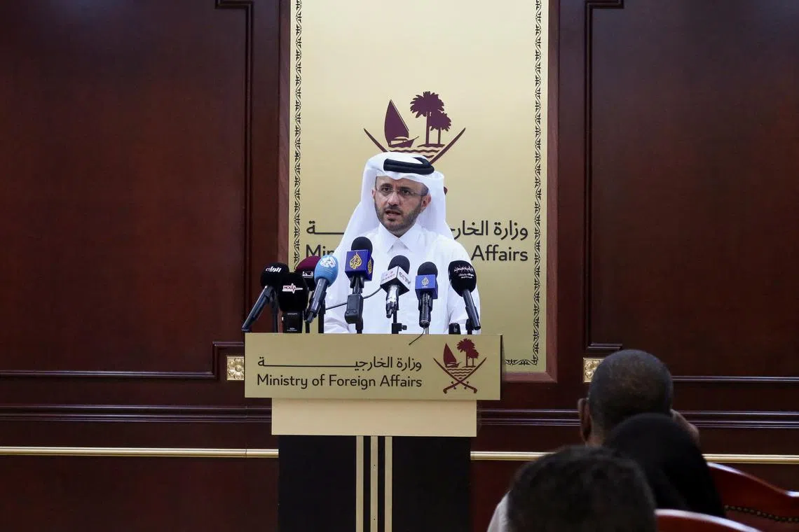 FILE PHOTO: Qatar's Foreign Ministry spokesman, Majed Al-Ansari speaks during weekly press briefing at the Ministry of Foreign Affairs in Doha, Qatar, April 23, 2024. REUTERS/Imad Creidi/File Photo