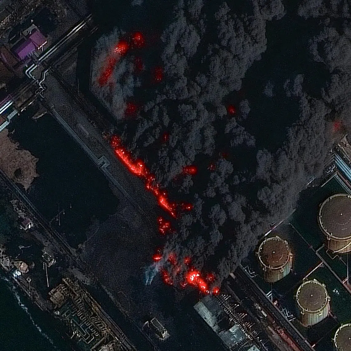 FILE PHOTO: A satellite near-infrared image shows smoke rising from Russia's Baltic port of Ust-Luga after a Ukrainian attack, in Ust-Luga, Leningrad Oblast, March 27, 2026. Vantor/Handout via REUTERS/File Photo