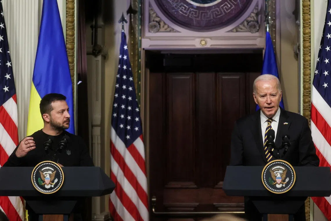 U.S. President Joe Biden and Ukraine's President Volodymyr Zelenskiy hold a joint press conference at the White House in Washington, U.S., December 12, 2023. REUTERS/Leah Millis/File Photo