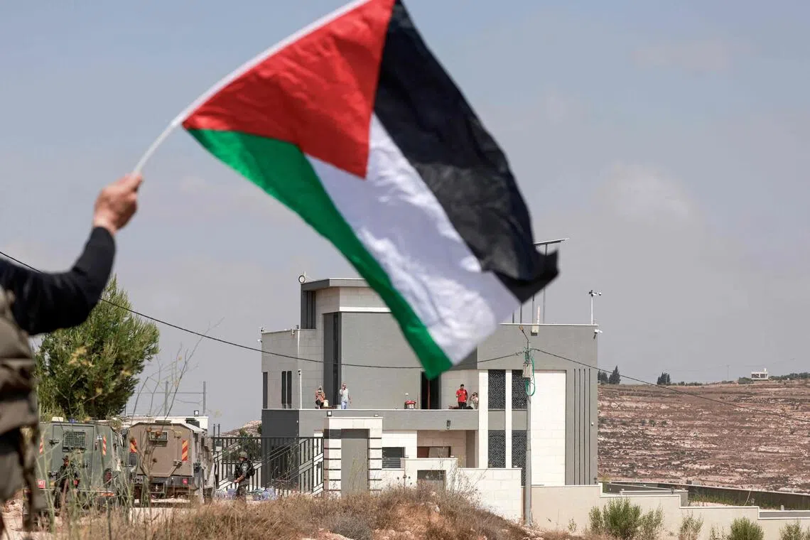 Activists try to get supplies to Palestinians besieged by settlers in the West Bank
