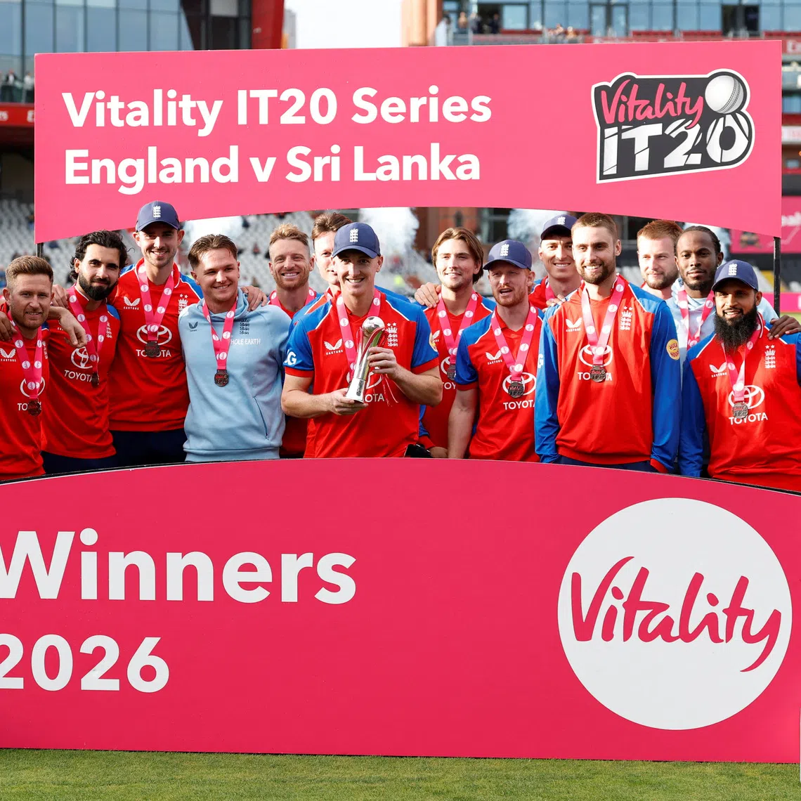 Cricket - Third Twenty20 International - England v Sri Lanka - Old Trafford Cricket Ground, Manchester, Britain - September 19, 2026 England's Harry Brook holds the trophy as he celebrates with teammates after winning the series Action Images via Reuters/Jason Cairnduff