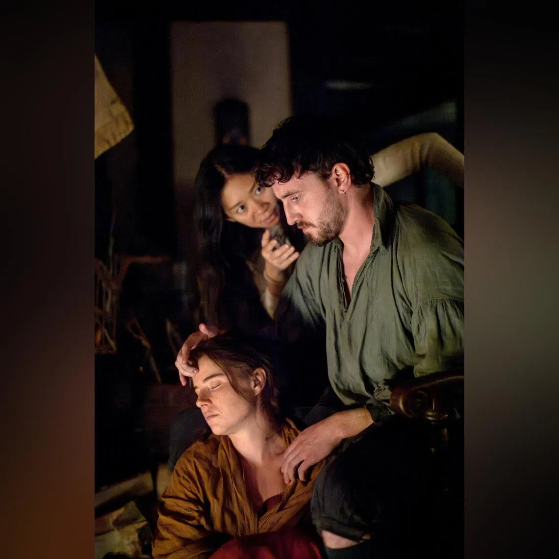 (From left) Jessie Buckley, director Chloe Zhao and Paul Mescal on the set of Hamnet.