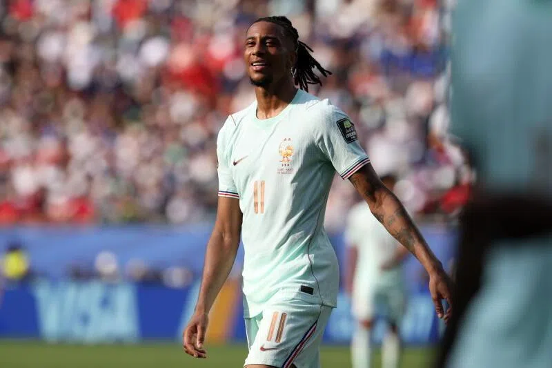 Michael Olise looks on during the quarter-final match against Morocco.