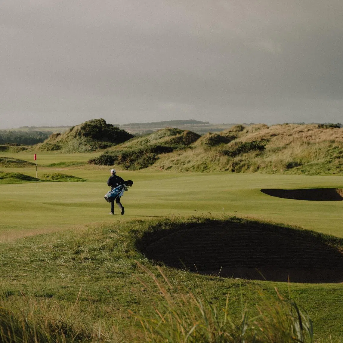 A golfer in St Andrews, Scotland, in Sept 2026.