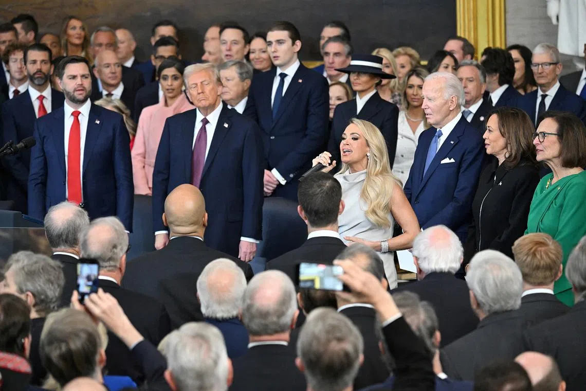US singer songwriter Carrie Underwood performs "America the Beautiful" after President Donald Trump was sworn in as the 47th President in the US Capitol Rotunda on Jan 20, 2025. 