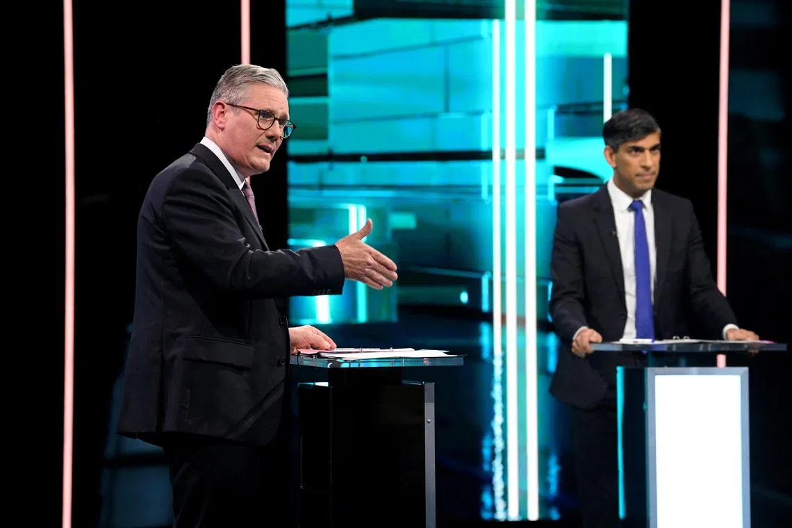 Britain's Conservative Prime Minister Rishi Sunak (right) and Labour party leader Keir Starmer stuck very much to their campaign lines, in their first debate just weeks before voters cast their ballots on July 4.