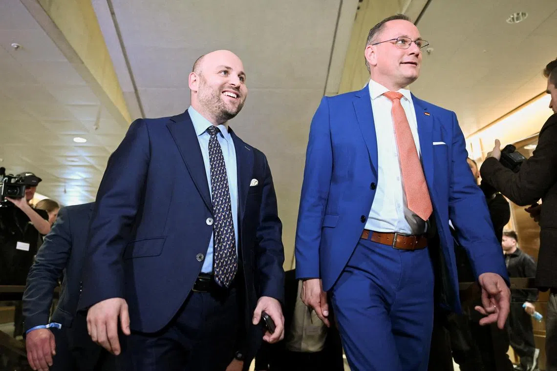 Markus Frohnmaier, top candidate of the far-right Alternative for Germany (AfD) party, and Tino Chrupalla, co-leader of Germany's far-right Alternative for Germany (AfD) party, arrive at the state parliament, the Landtag, of Baden-Wuerttemberg, following the exit poll results in Stuttgart, Germany, March 8, 2026. REUTERS/Jana Rodenbusch/File Photo