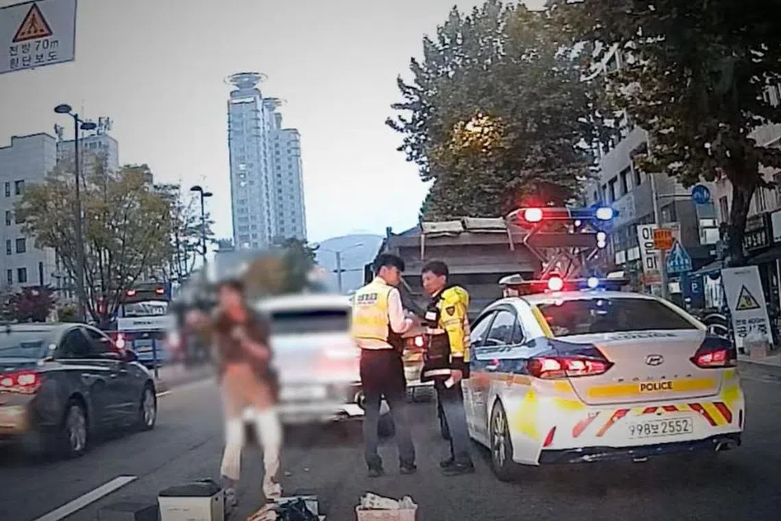 The woman's antics were caught on camera and shared via Seoul Police’s official YouTube channel.