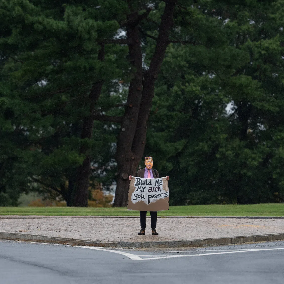A demonstrator protests US President Donald Trump’s proposed triumphal arch at its proposed site in Memorial Circle on Sept 21.