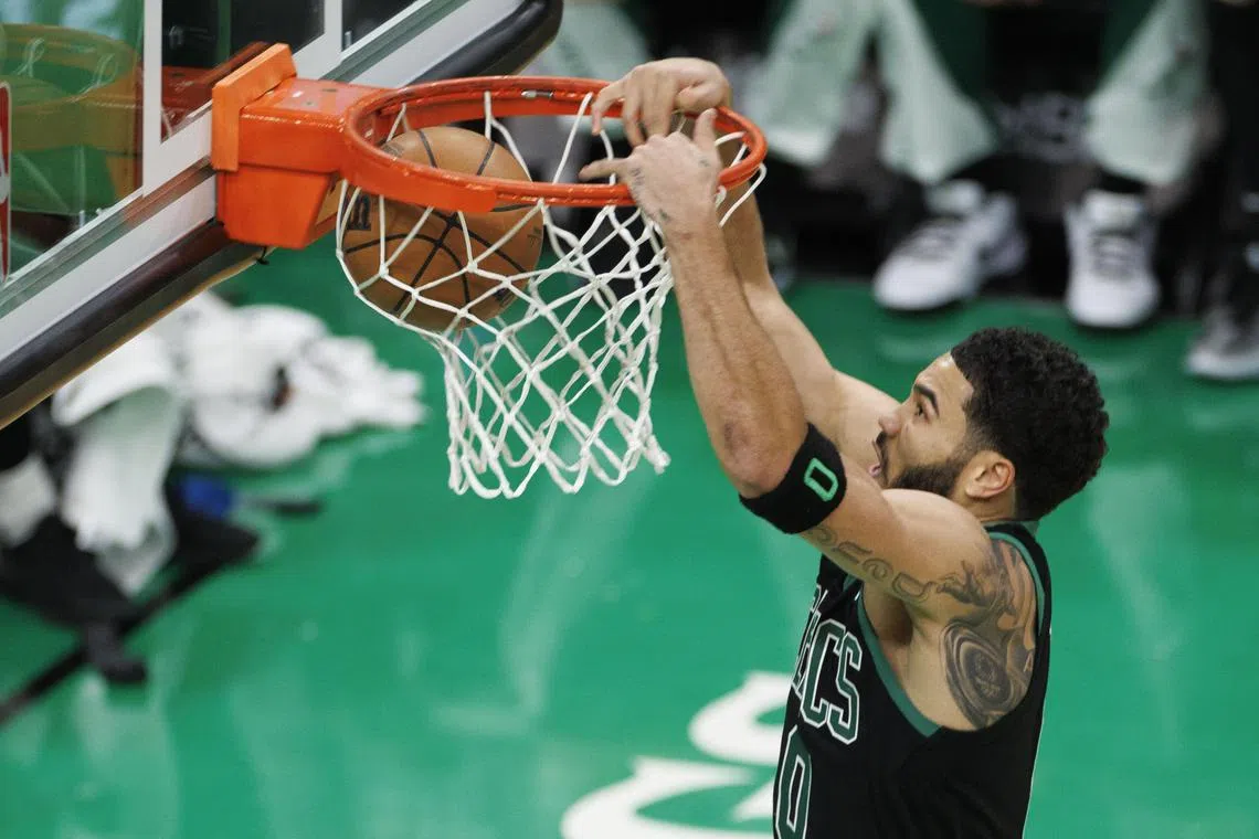 Boston Celtics forward Jayson Tatum dunking the ball during the first half of the NBA game between the Boston Celtics and the New York Knicks at TD Garden on Monday. He scored 35 points as Boston won 114-98.