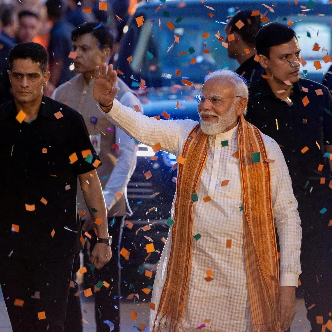 India's Prime Minister Narendra Modi greets his supporters as he arrives at the Bharatiya Janata Party (BJP) headquarters as the BJP won the Assam state assembly election and was on course to win West Bengal, in New Delhi, India, May 4, 2026. REUTERS/Adnan Abidi   REFILE- CORRECTING FROM "AS BJP CELEBRATES ITS WIN IN THE WEST BENGAL AND ASSAM STATES' ASSEMBLY ELECTIONS" TO "AS THE BJP WON THE ASSAM STATE ASSEMBLY ELECTION AND WAS ON COURSE TO WIN WEST BENGAL".