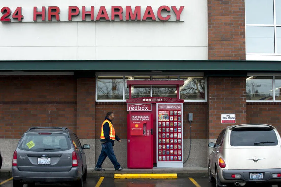 A Redbox DVD rental kiosk in Seattle on Feb. 10, 2012. The parent company of Redbox, which rents movies through kiosks, filed for Chapter 11 bankruptcy protection on Friday.