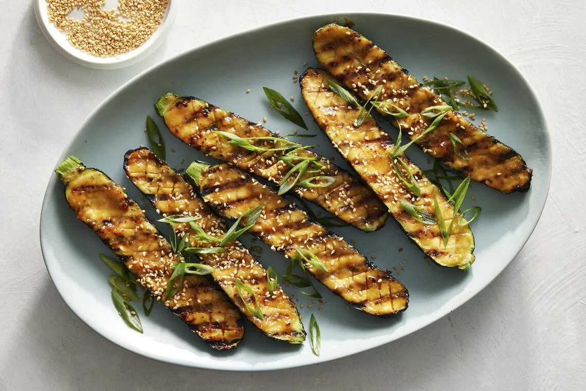 Grilled zucchini with miso glaze. With its mild flavor and high water content, zucchini may not seem like a nutritional standout. But this summer fruit (yes, it’s a fruit) can help lower inflammation, support clearer vision and promote metabolic health. Food Stylist: Barrett Washburne. (Mark Weinberg/The New York Times)
