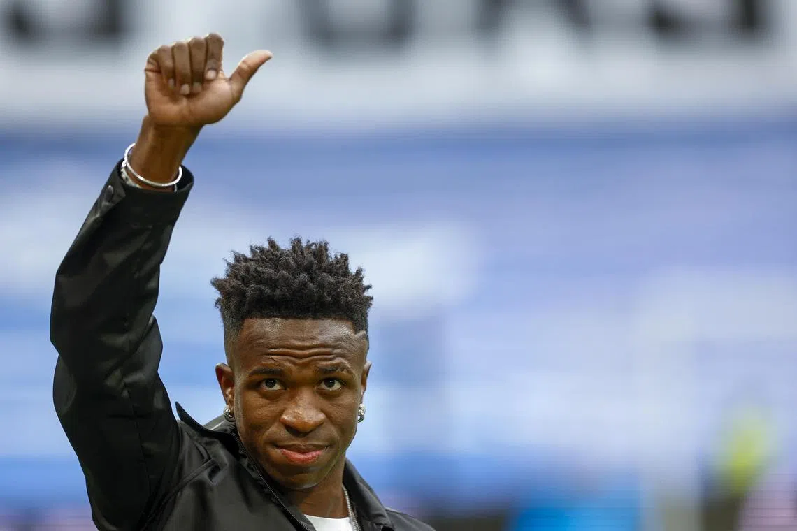 Vinicius Junior gestures to Real Madrid fans ahead of the team's LaLiga match against Rayo Vallecano.
