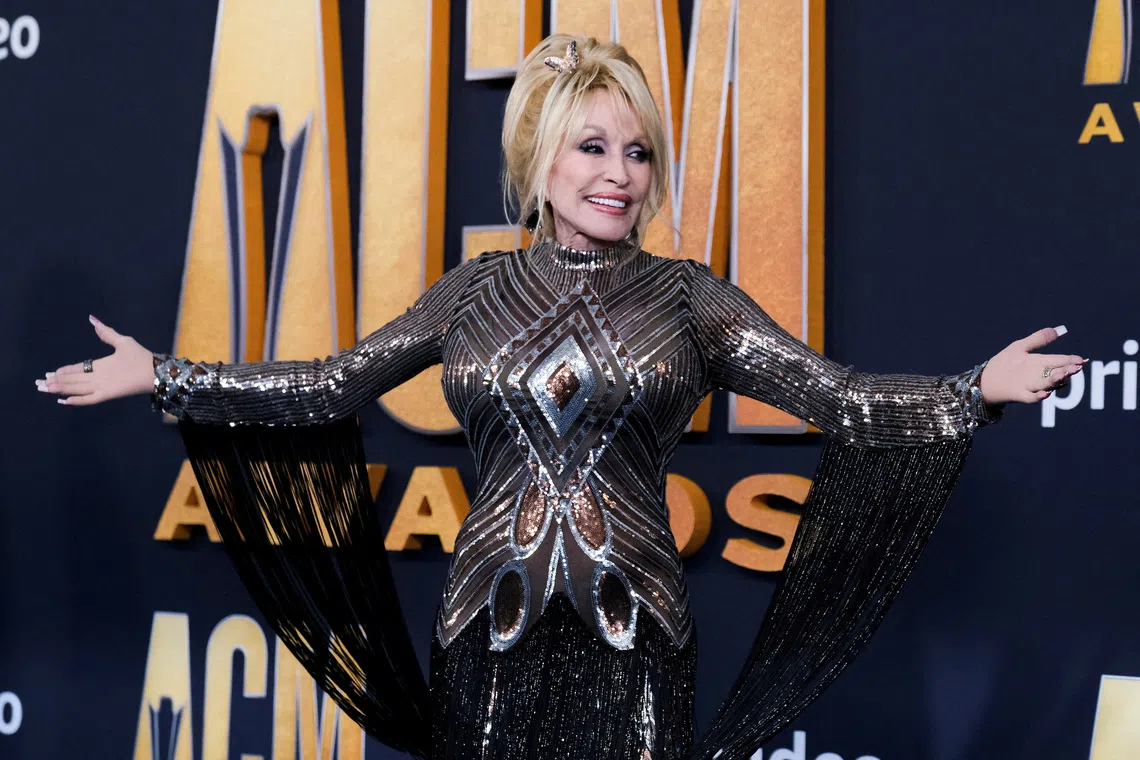 Dolly Parton’s appearance was the object of intense interest. Initially embarrassed, she eventually found the humour in frequent questions about her extravagant dress sense and generous figure.