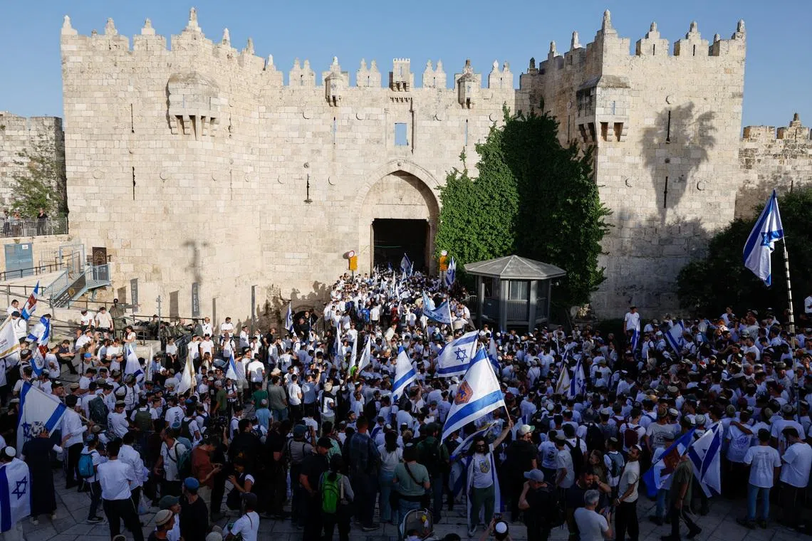 Israelis participate in the annual Jerusalem Day march in Jerusalem, May 14, 2026. REUTERS/Amir Cohen