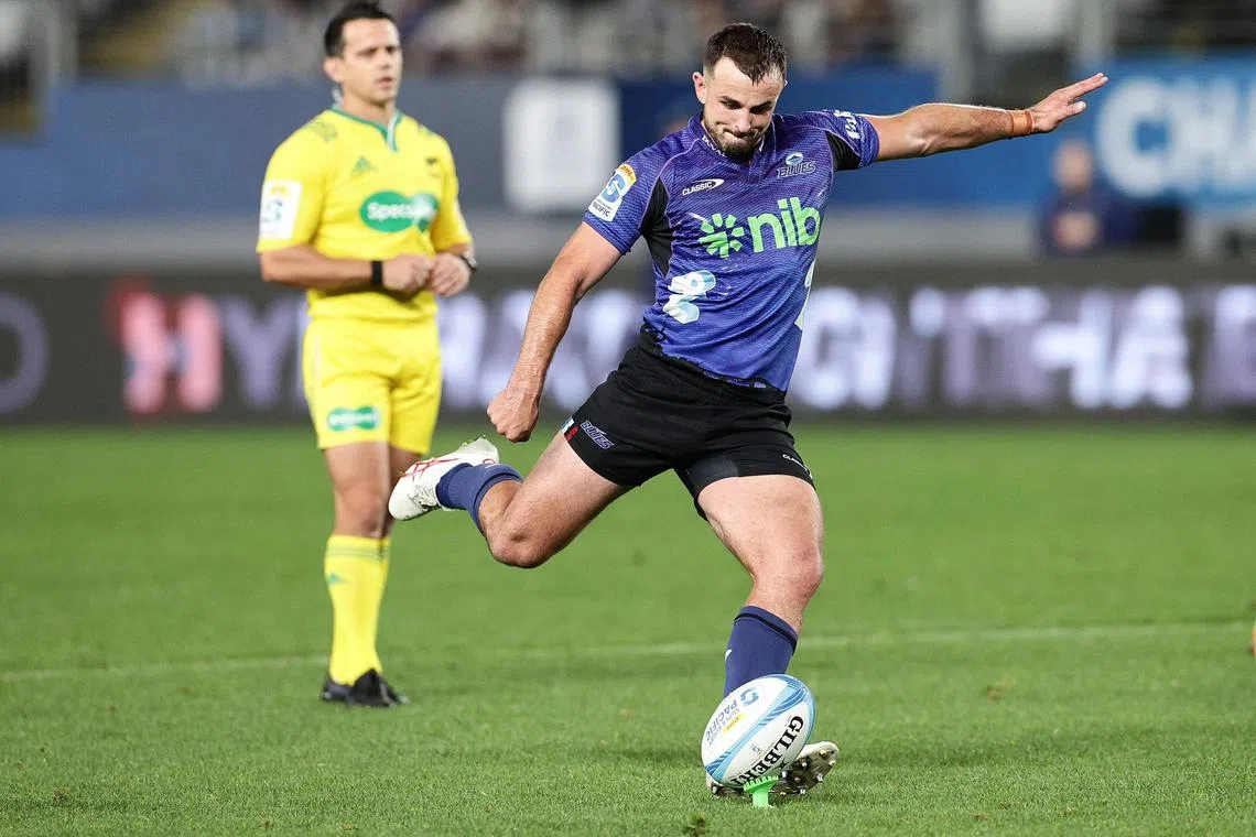 Auckland Blues' Harry Plummer kicks at goal at Eden Park during the Super Rugby Pacific season in June 2024.
