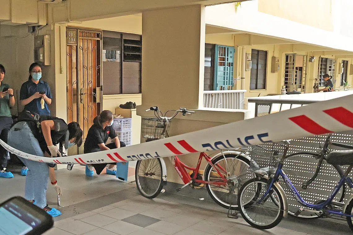 A police cordon on the eighth floor of Blk 805 King George's Avenue on Dec 22 after a fight that broke out between neighbours turned fatal.
