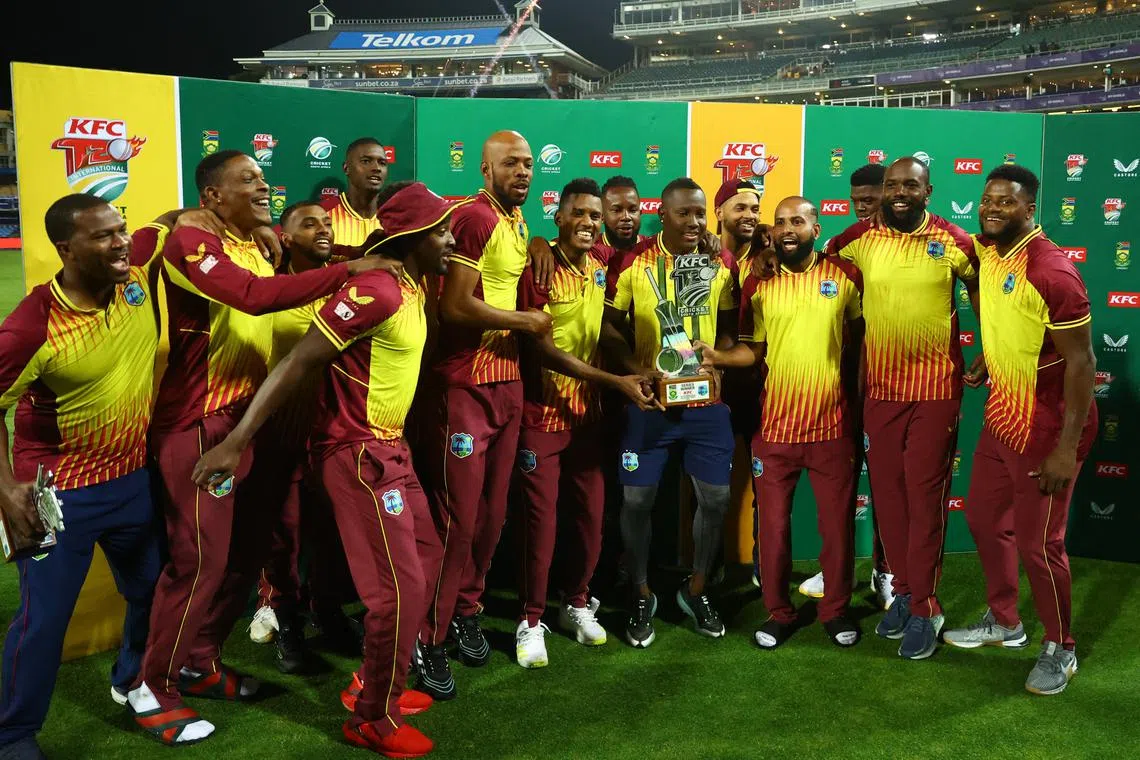 Cricket - Third Twenty20 - South Africa v West Indies - Wanderers Stadium, Sandton, South Africa - March 28, 2023 West Indies' Rovman Powell lifts the trophy with teammates after winning the series REUTERS/Siphiwe Sibeko/File Photo