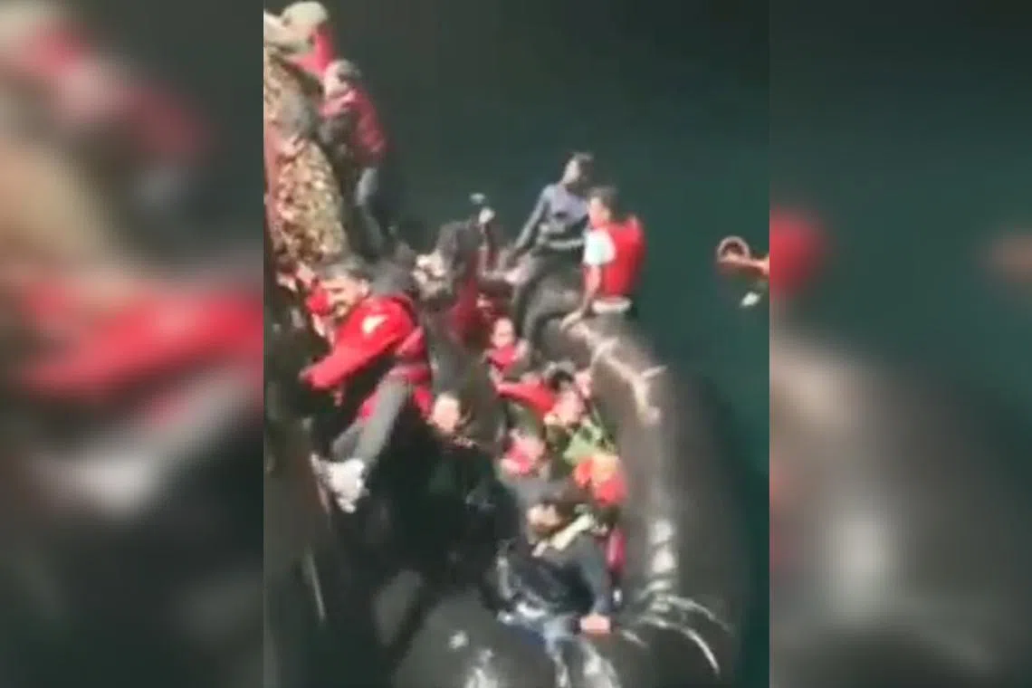 People from Afghanistan, Iraq, Senegal and India were said be aboard the dinghy, and the fishing crew spent two hours pulling them from the stricken vessel.