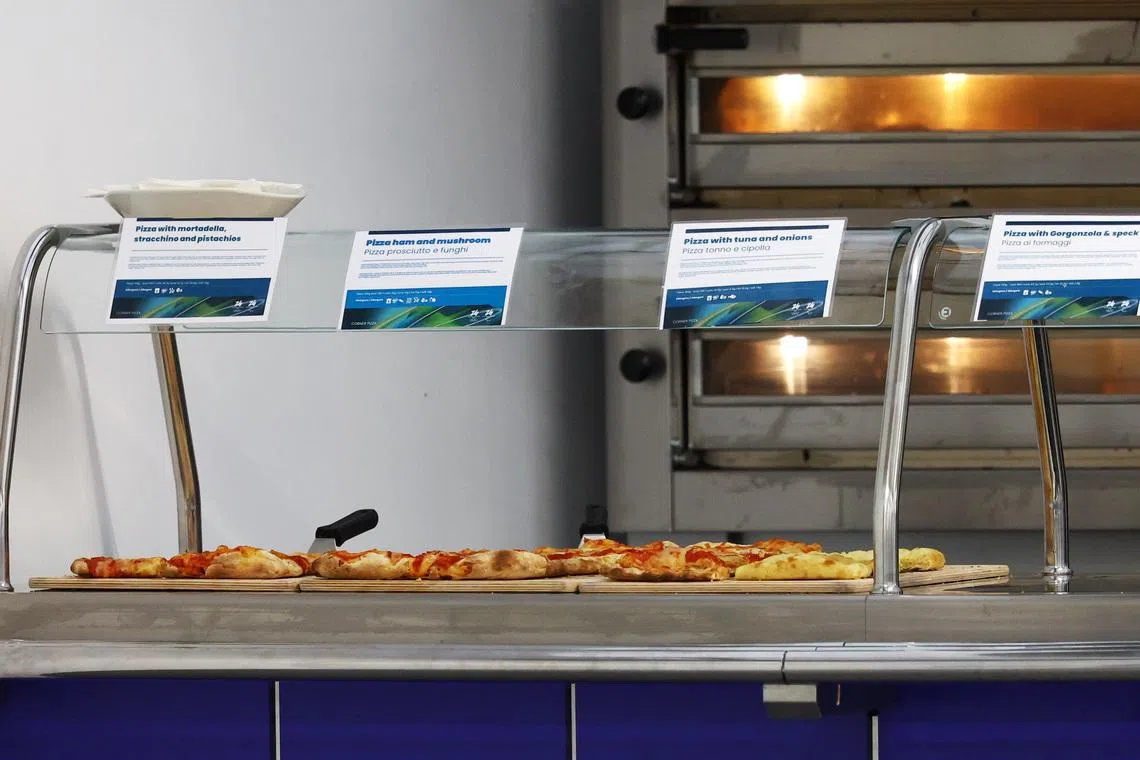 Milano Cortina 2026 Winter Olympics - Press Visit at the Olympic and Paralympic Athletes' Village - Cortina d'Ampezzo, Italy - February 3, 2026 General view of pizzas served in the cafeteria at the Olympic and Paralympic Athletes' Village REUTERS/Lisi Niesner
