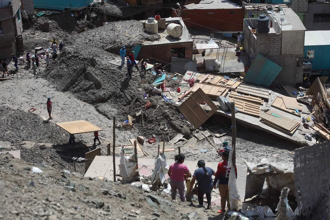 Two people are missing after the riverside town of Secocha was hit by a massive landslide.