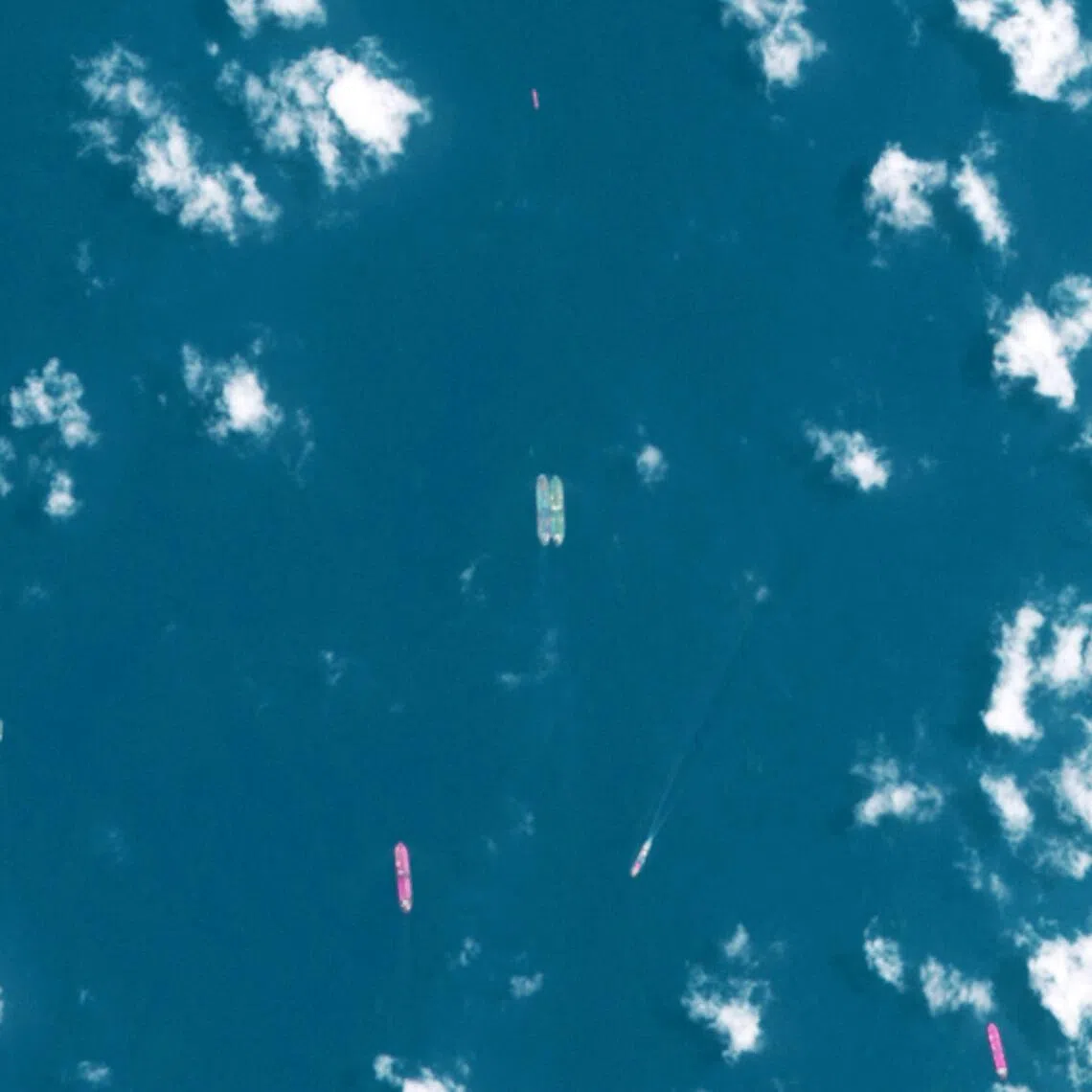 A satellite image released by the European Space Agency shows two vessels conducting what appears to be an offshore cargo transfer some 70km off the south-east coast of the Malay Peninsula, near Singapore, on April 3.
