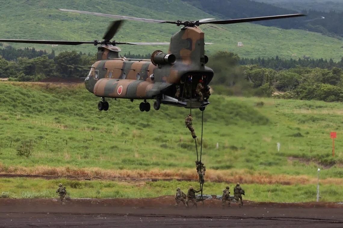 Japanese Ground Self-Defense Force soldiers rappelling from a CH-47 Chinook helicopter, during an annual training session near Mount Fuji at Higashifuji training field in Gotemba, Shizuoka, Japan, on June 7, 2026.