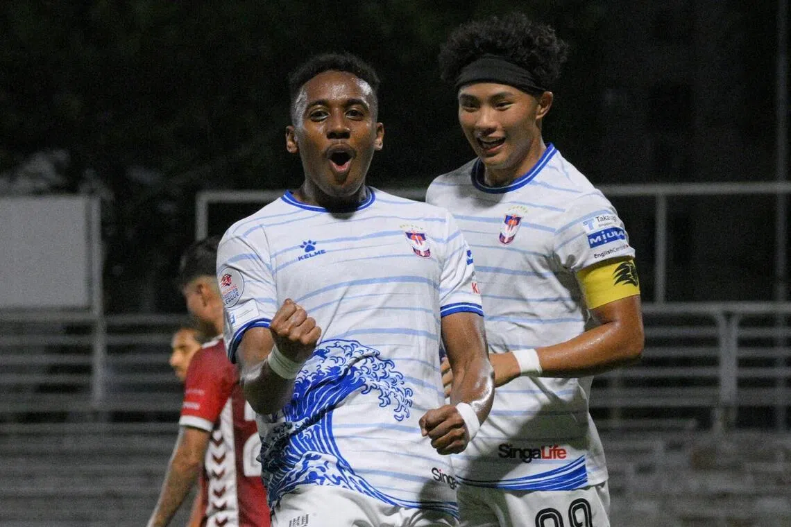 Albirex Niigata striker Abdul Rasaq (left) celebrates with team-mate Shingo Nakano after scoring the opener in the 2-0 Singapore Premier League win over Tanjong Pagar United.