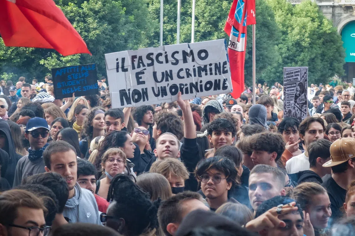 Protesters gather during the ‘Italia in Piazza’ demonstration in Milan, Italy, on Oct 17.