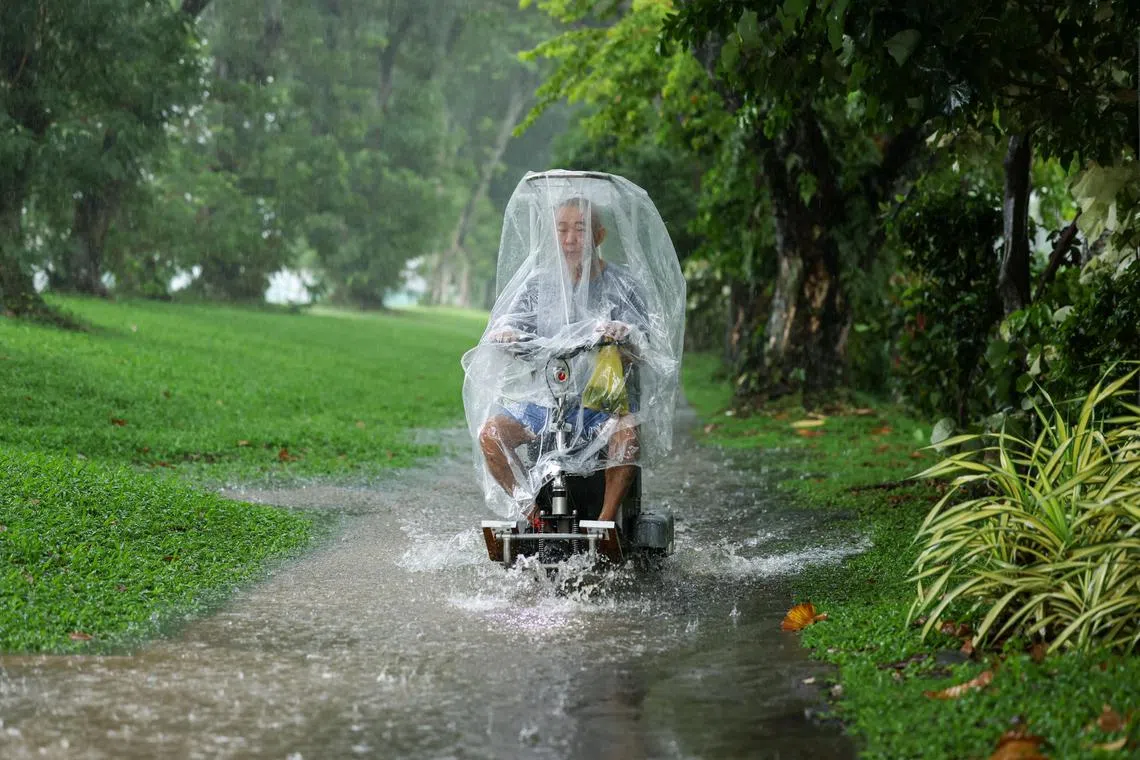 An elderly PMA rider was caught in a flooded pedestrian path while traveling along Yishun Avenue 2 on April 13.