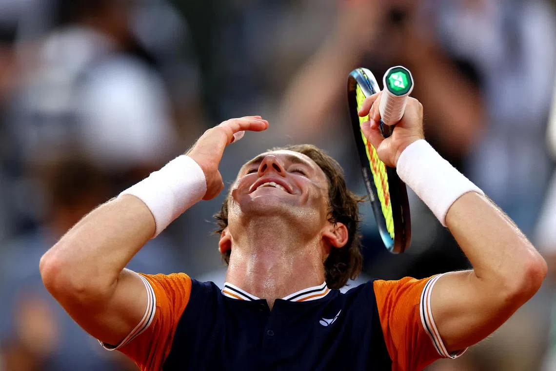 Norway's Casper Ruud celebrates winning his semi final match against Germany's Alexander Zverev.