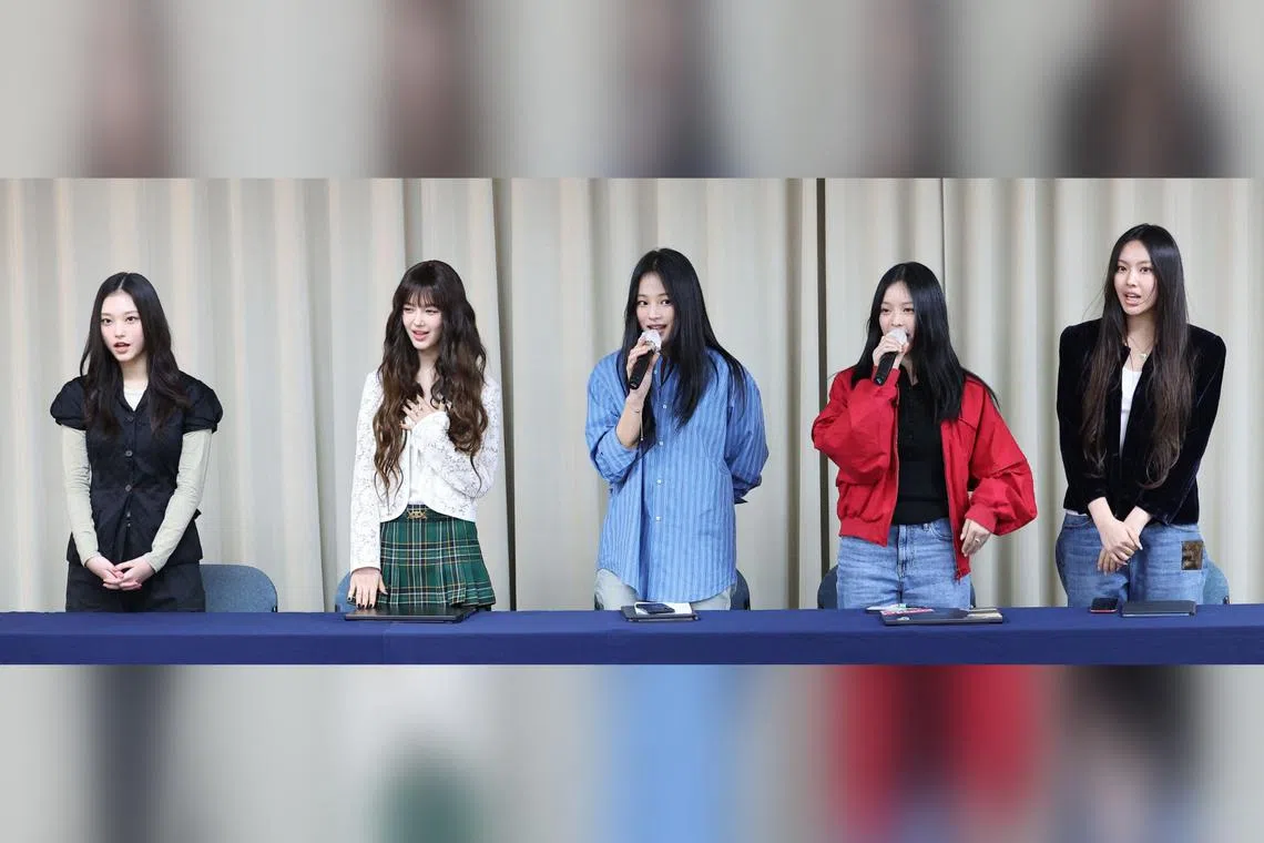 South Korean K-pop girl group NewJeans members (from left) Haerin, Danielle, Minji, Hanni and Hyein attend a press conference in Seoul on Nov 28, 2024. 