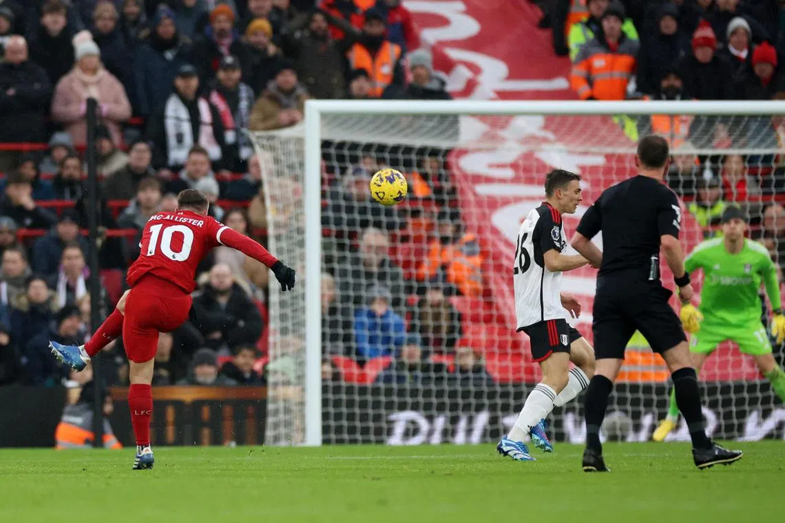 Liverpool's Alexis Mac Allister scoring his first goal for the Reds with a magnificent long-range strike in the 38th minute against Fulham.