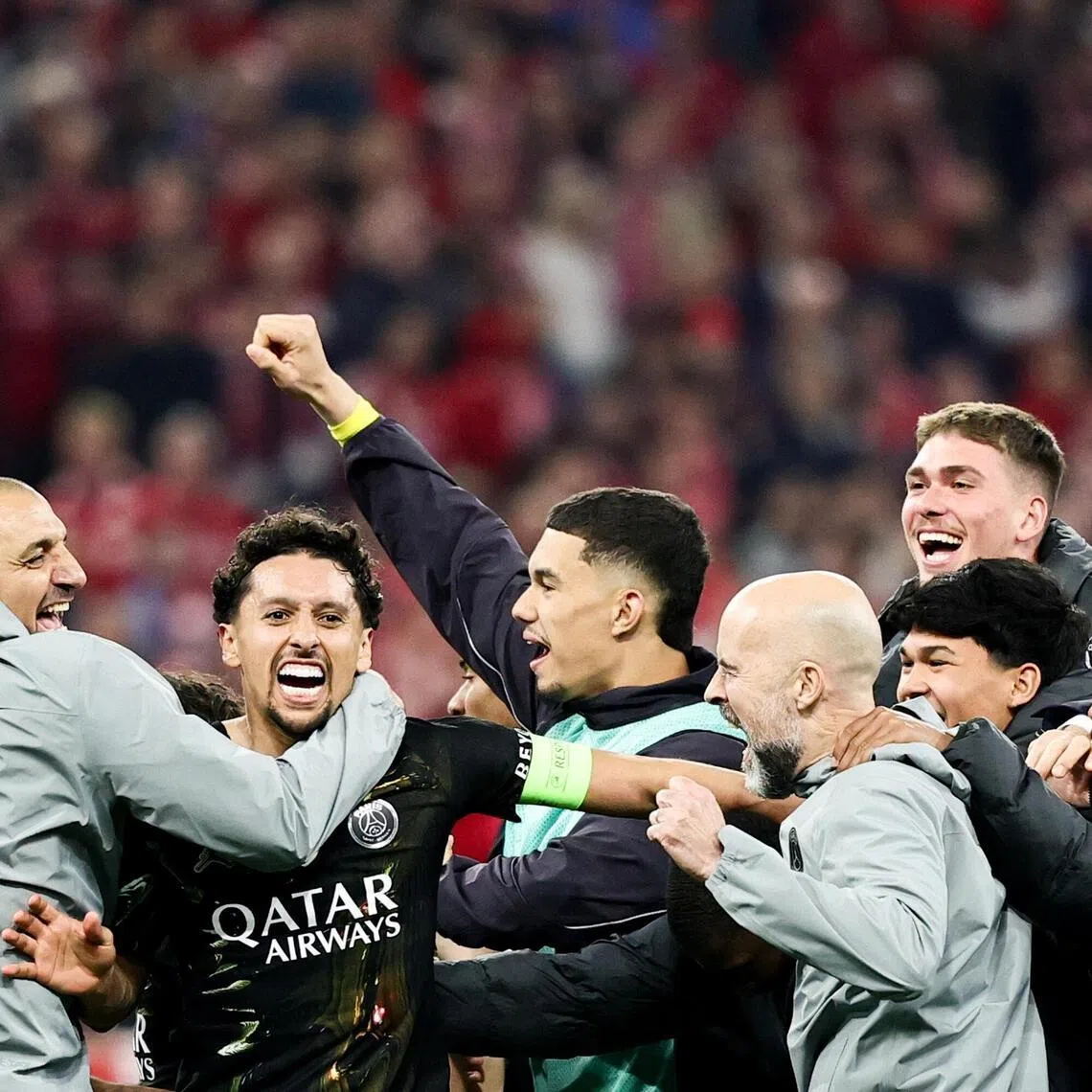 PSG players celebrate reaching the Champions League final, after drawing 1-1 at Bayern Munich and going through with a 6-5 aggregate victory.