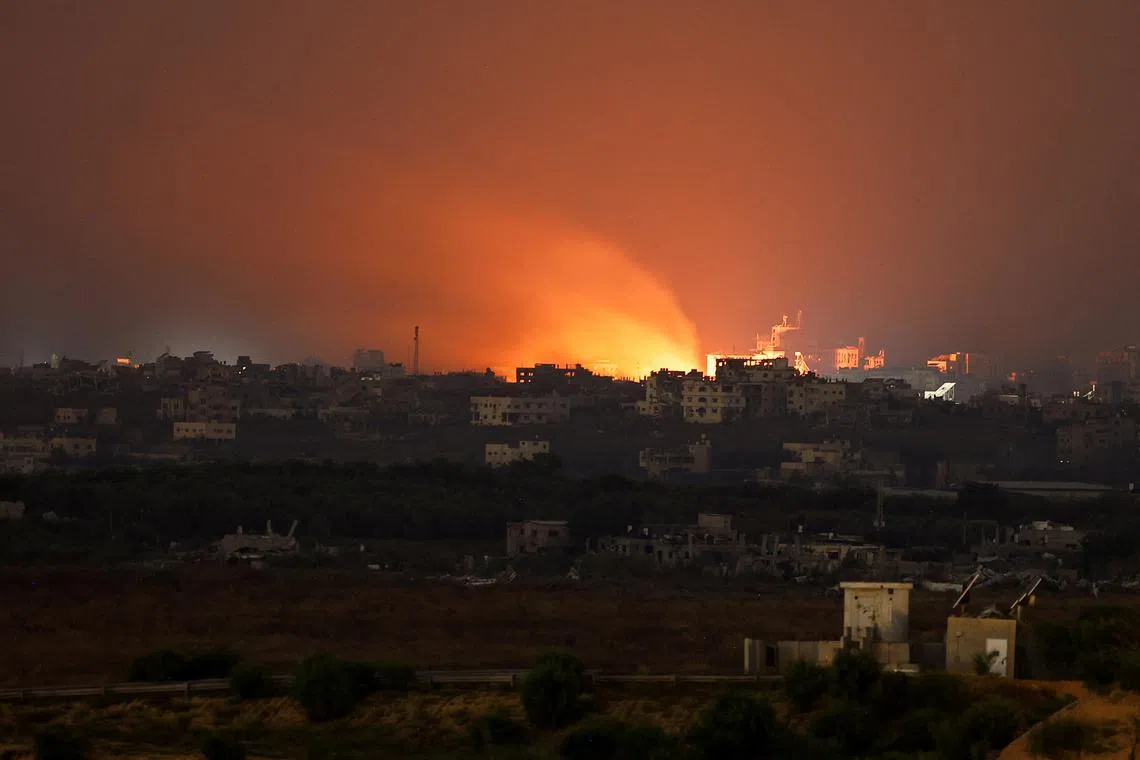 FILE PHOTO: Fire burns in north Gaza, amid the ongoing conflict between Israel and the Palestinian Islamist group Hamas, as seen from Israel, June 1, 2024. REUTERS/Amir Cohen/File Photo