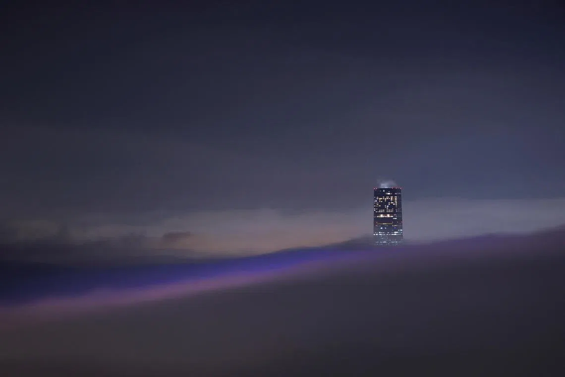 The 484-metres-high International Commerce Centre or ICC, the highest skyscraper in the city, is seen amidst foggy weather at the Victoria Harbour in Hong Kong, China March 16, 2024. 