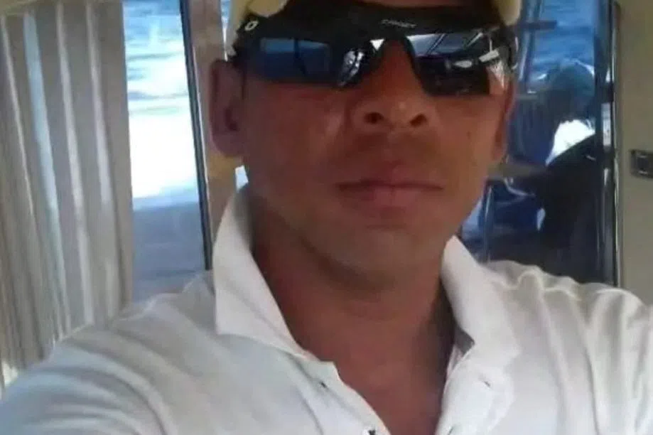 Colombian fisherman Alejandro Carranza poses for a photograph on his boat in this undated handout photograph, taken on the shore of Santa Marta, Colombia, and made available to Reuters on December 5, 2025. Daniel Kowalik/Handout via REUTERS