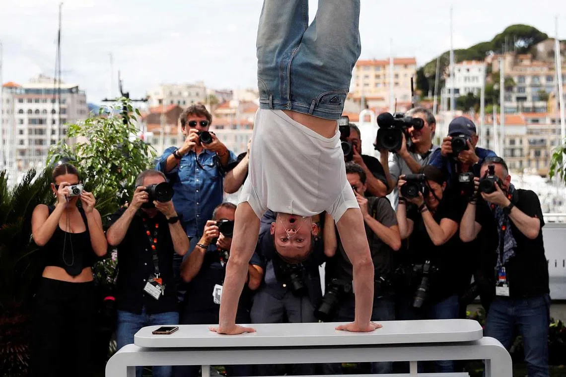 Cast member Tom Mercier poses at a photocall for the film "Le Regne Animal" (The Animal Kingdom) at the 76th Cannes Film Festival, France, May 18.