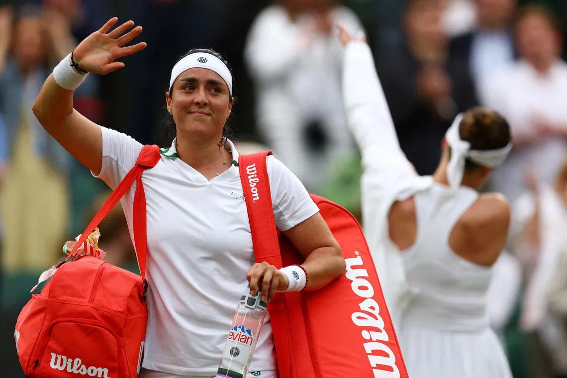 FILE PHOTO: Tennis - Wimbledon - All England Lawn Tennis and Croquet Club, London, Britain - July 6, 2024 Tunisia's Ons Jabeur waves at fans after losing her third round match against Ukraine's Elina Svitolina REUTERS/Hannah Mckay/File Photo