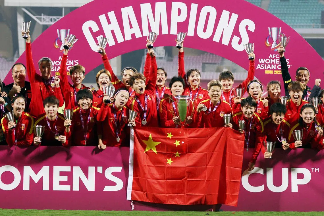 China celebrating after winning the Women's Asian Cup in 2022.