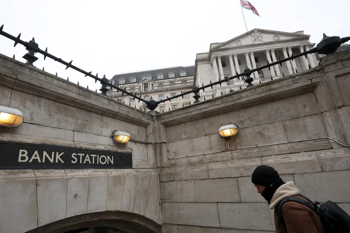 FILE PHOTO: A person enters a tube station near the Bank of England building in London, Britain, February 3, 2025.  REUTERS/Toby Melville/File Photo