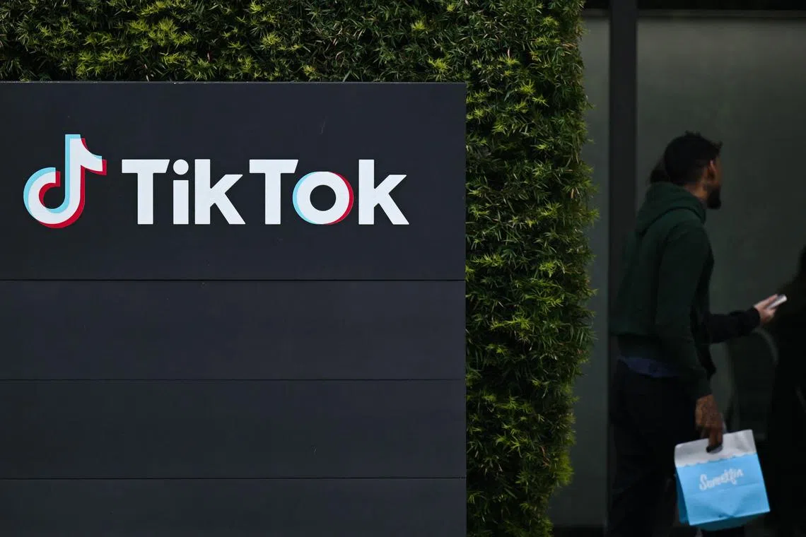 The TikTok logo is displayed outside TikTok social media app company offices in Culver City, California, on March 16, 2023. (Photo by Patrick T. Fallon / AFP)