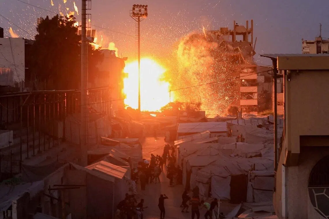 Smoke and flames rise after an Israeli airstrike hit a mosque in Gaza City, July 28, 2026. REUTERS/Dawoud Abu Alkas TPX IMAGES OF THE DAY