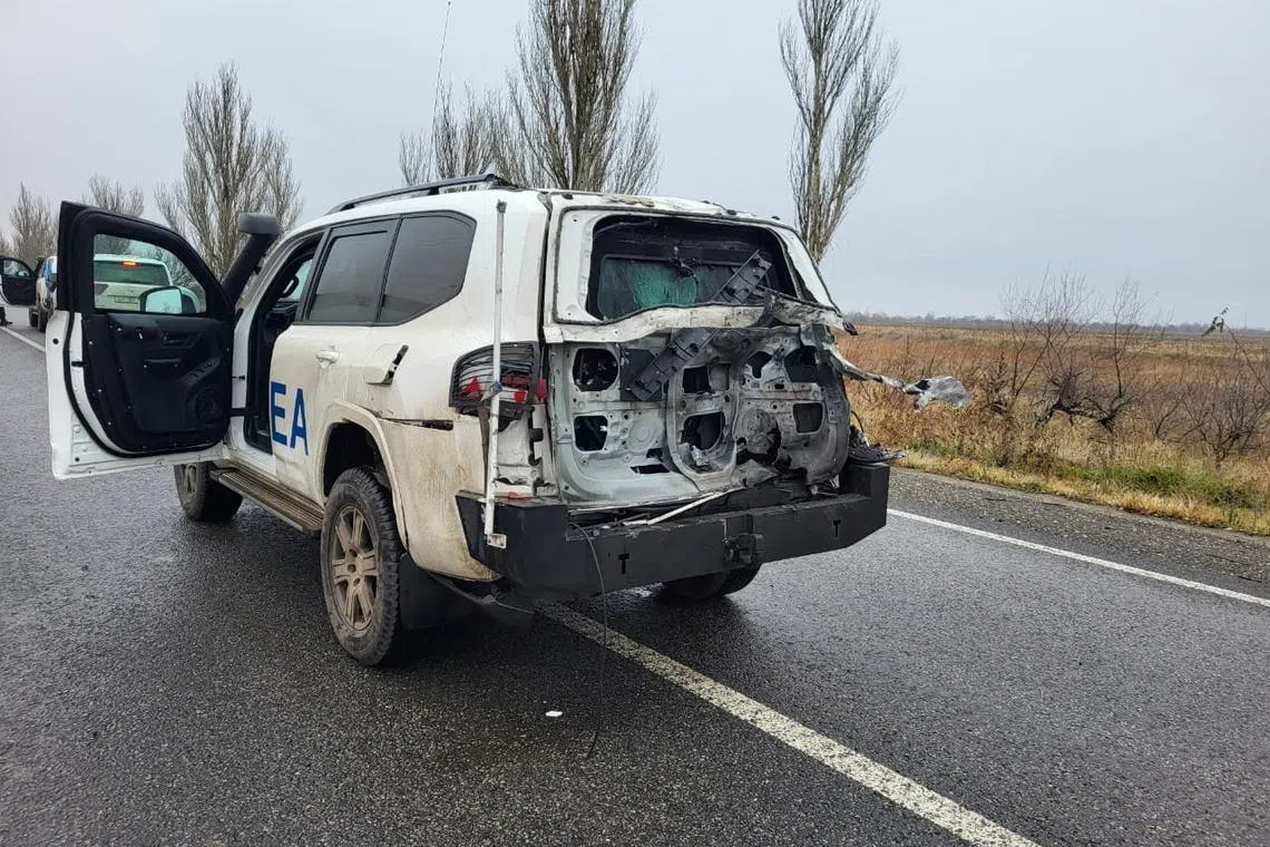 A view shows an official vehicle of the International Atomic Energy Agency (IAEA) damaged by a drone strike on a road in Zaporizhzhia region, amid Russia's ongoing attack, in Ukraine, December 10, 2024. Ukraine's President Volodymyr Zelenskiy via X/Handout via REUTERS