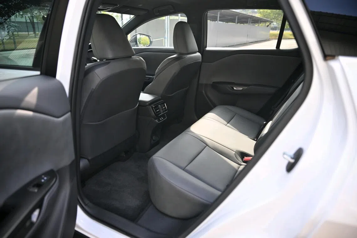 The second row is super spacious, and has a flat floor  which eludes the new Lexus ES350e.