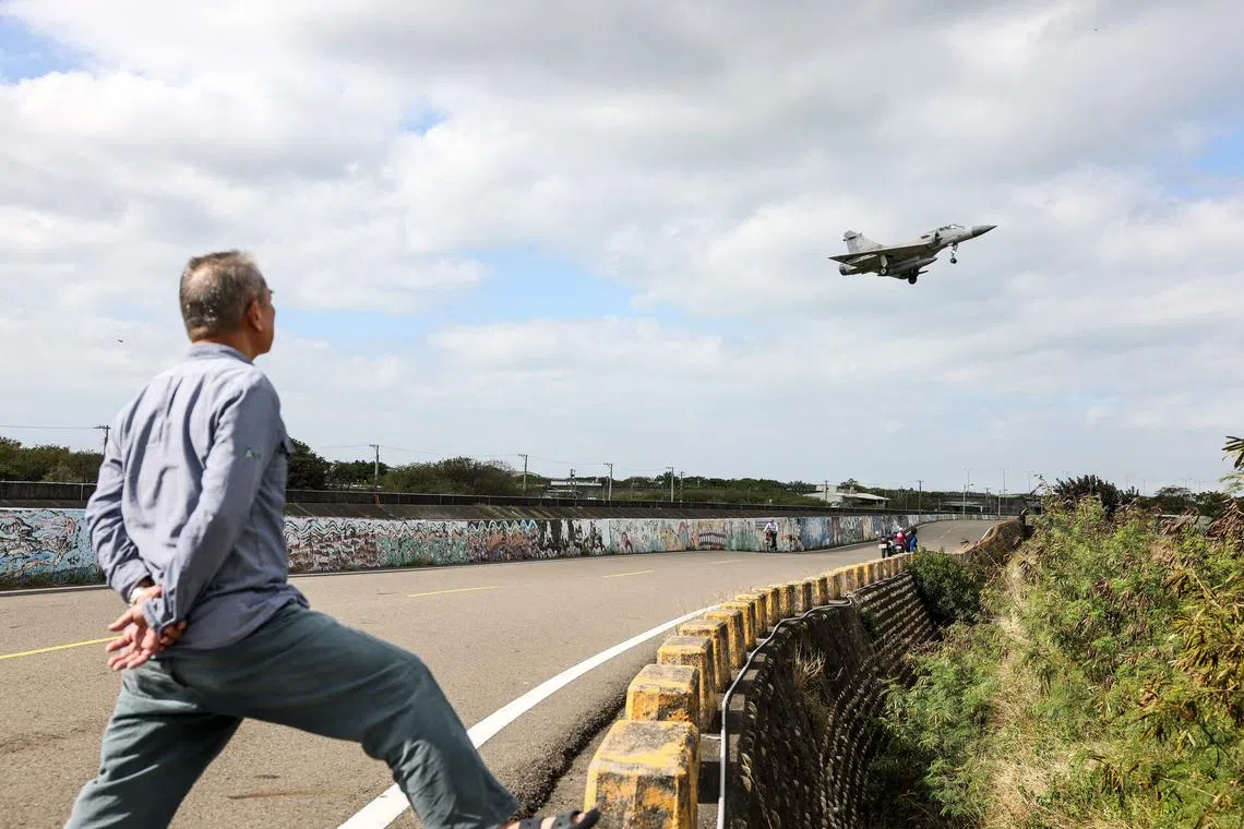 (FILES) A Taiwanese Air Force Mirage 2000 fighter jet prepares to land at an Air Force base in Hsinchu on December 10, 2024. Taiwan dispatched forces on February 26, 2025 in response to "live-fire" drills conducted by China off the self-ruled island, Taipei's defence ministry said, condemning the exercises as dangerous. (Photo by I-Hwa CHENG / AFP)
