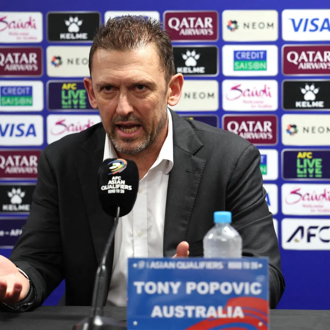 Soccer Football - World Cup - AFC Qualifiers - Third Round - Group C - Australia v Indonesia - Post-match Press Conference - Allianz Stadium, Sydney, Australia - March 20, 2025 Australia's Tony Popovic during the press conference after the match REUTERS/Hollie Adams