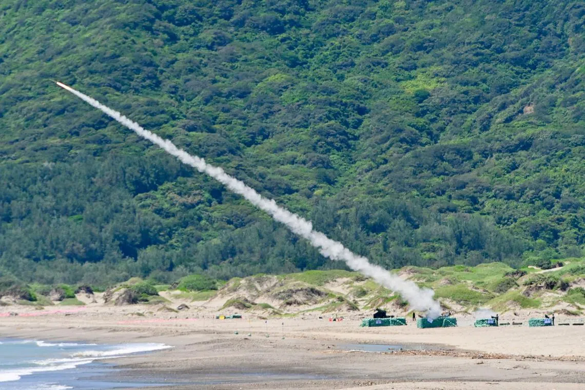 A Taiwanese military vehicle launching a missile during a live-firing exercise in Pingtung county on July 4.
